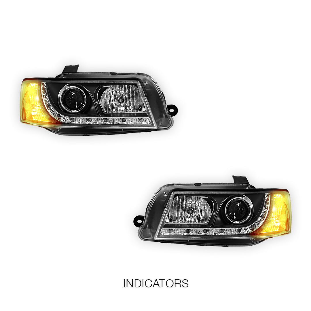 Holden Commodore VZ (2004 - 2007) Black DRL LED Projector Headlights LH + RH